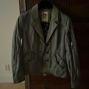Never wear, 100% jacket. Unique European style. Grey color.